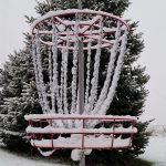 disc golf basket snow winter